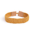 Handwoven bracelet with gold thread