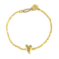 Gold bracelet with a small heart