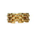 RING WILL gold plated interwoven ring, showcasing architectural design and textured finish for elegant style.