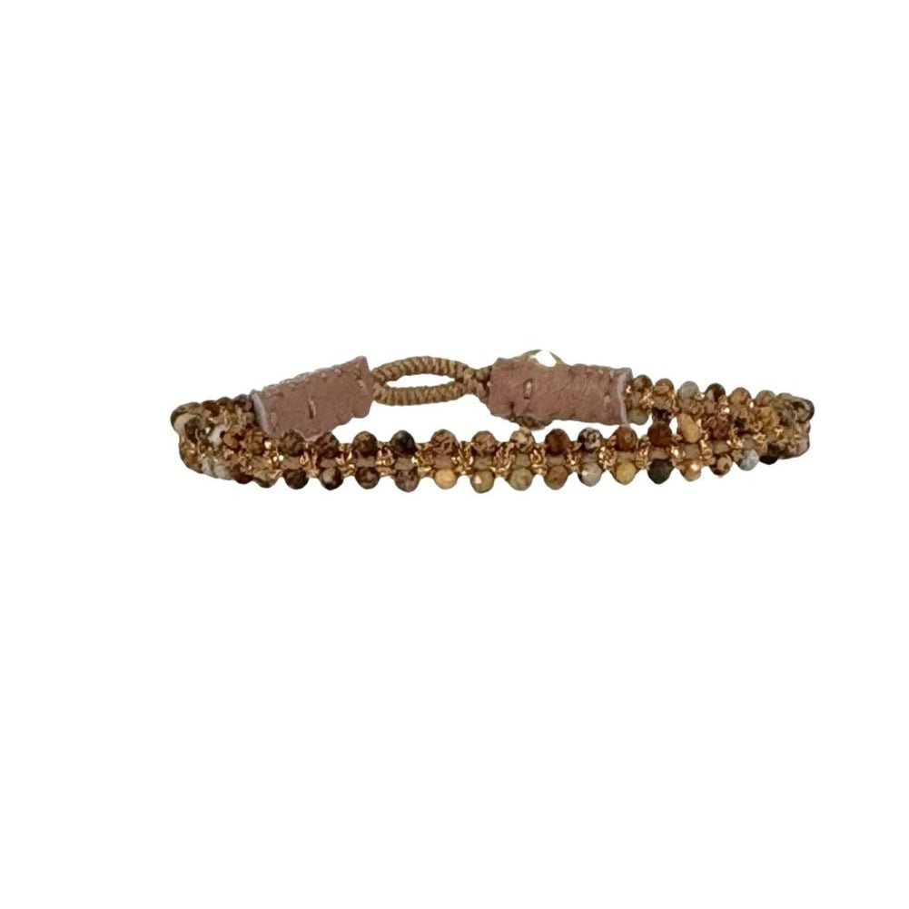 Elegant handmade bracelet showcasing semi-precious stones and high-end finish.