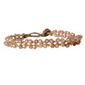 JILL JAKE handmade semi-precious stone bracelet with gold-plated closure and adjustable rope.