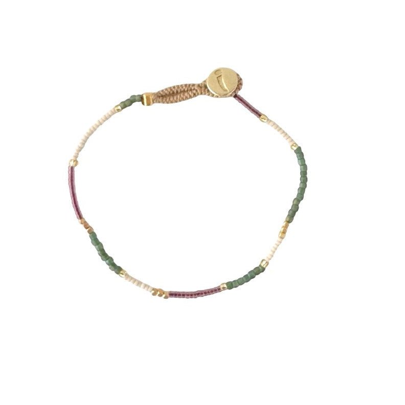 Colourful friendship bracelet with mixed beads in fine jewelry design.