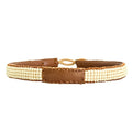 Elegant handcrafted men's leather bracelet with bone-colored beads and sterling silver closure.