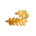 Gold-plated brass leaf ring, adjustable one-size-fits-all design, inspired by nature with a shiny finish.